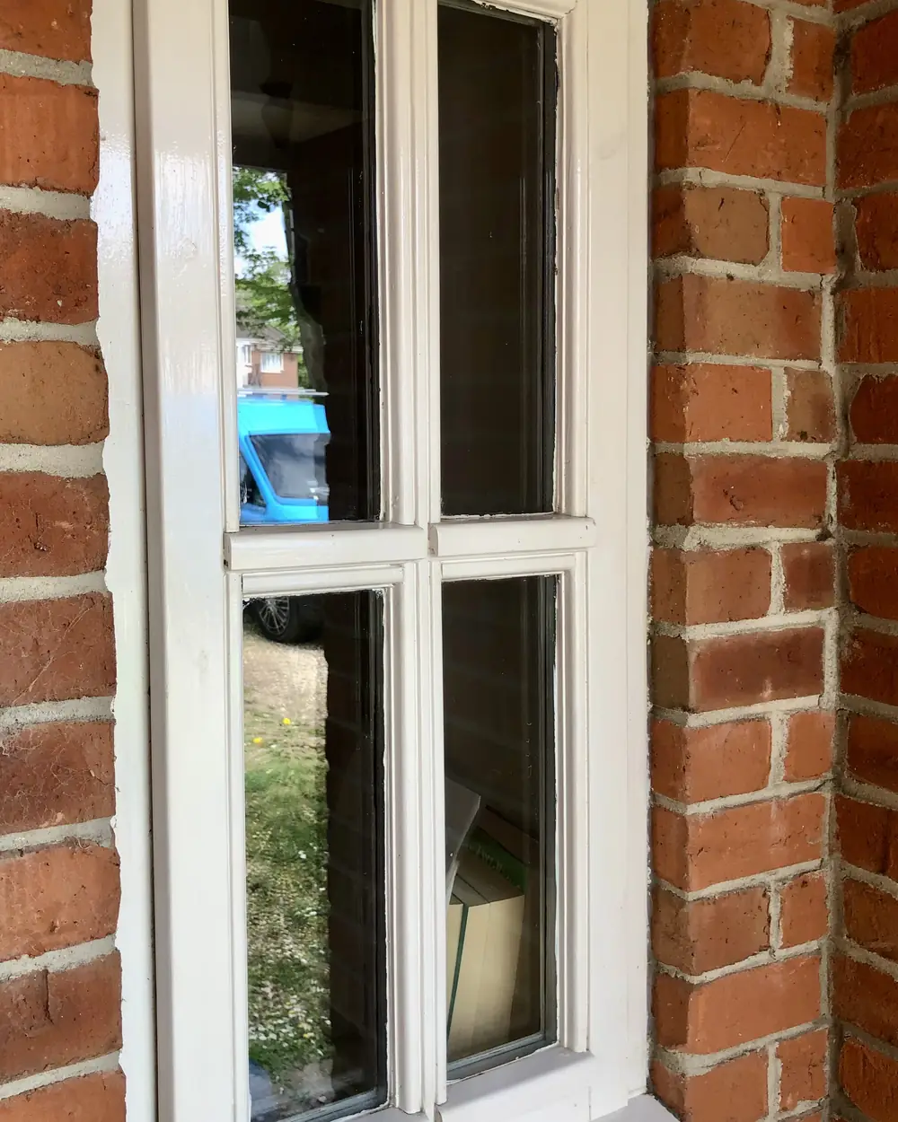 After: the same window with clean frames and clear glass